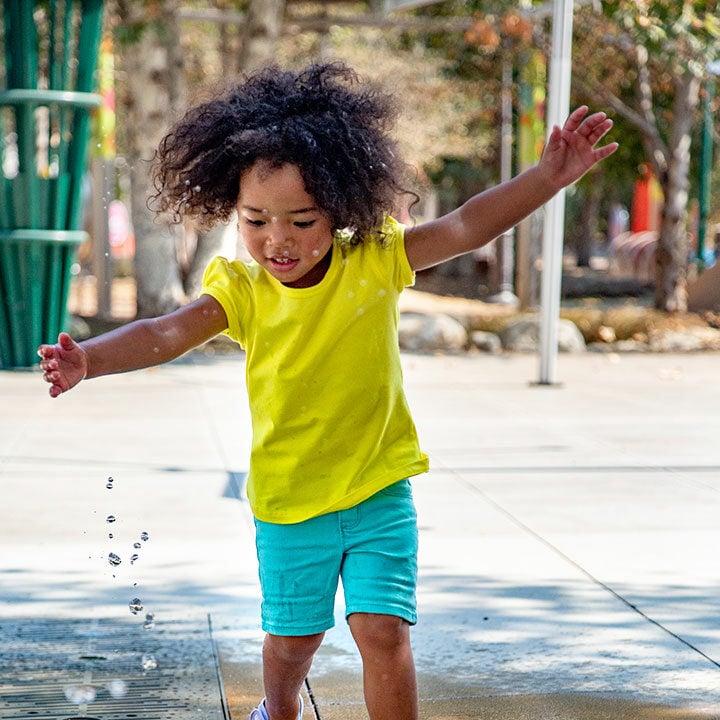 girl playing at kidspace