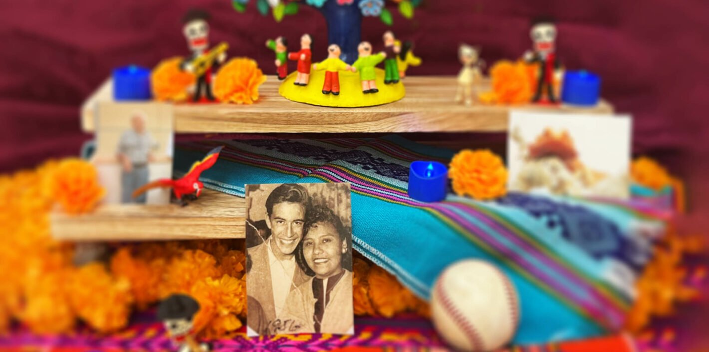day of the dead altar with photo, baseball and marigolds