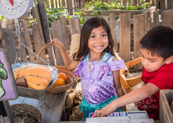 boy and girl at muddy boot farm store