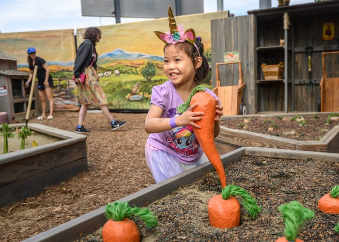 Girl With Giant Carrot