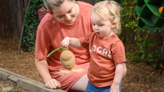Mom and Kid Muddy Boot Farm