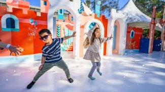 Children dancing in snow