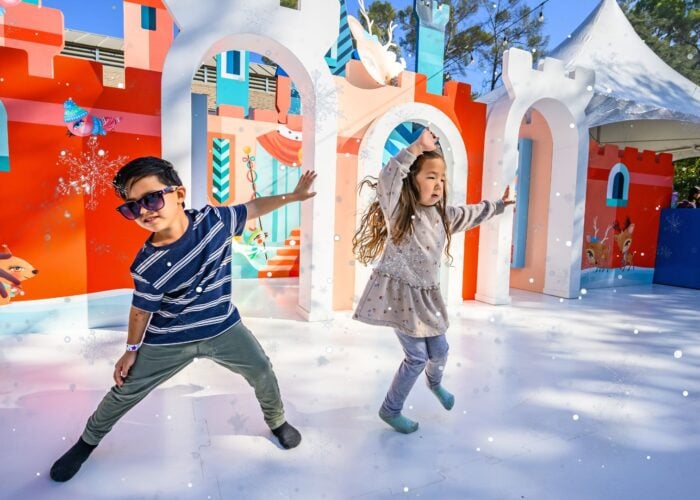 Children dancing in snow