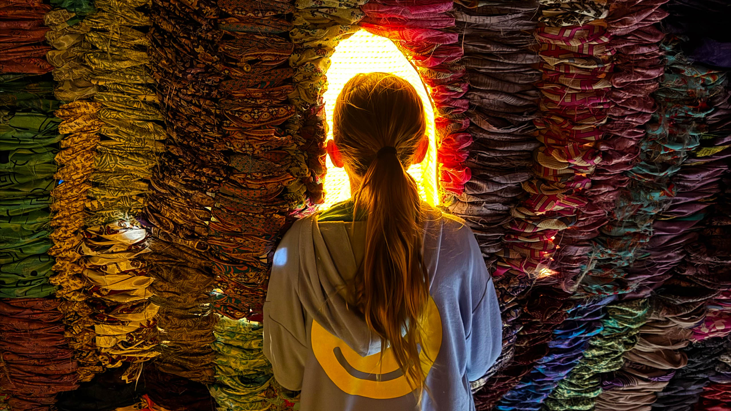 a girl stares into a bright memory chamber in Suchtira Mattai's "Hollow of Memory"
