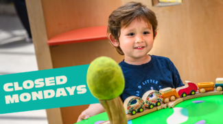 Child playing with a train
