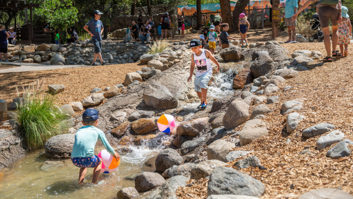 Children play in riverbed
