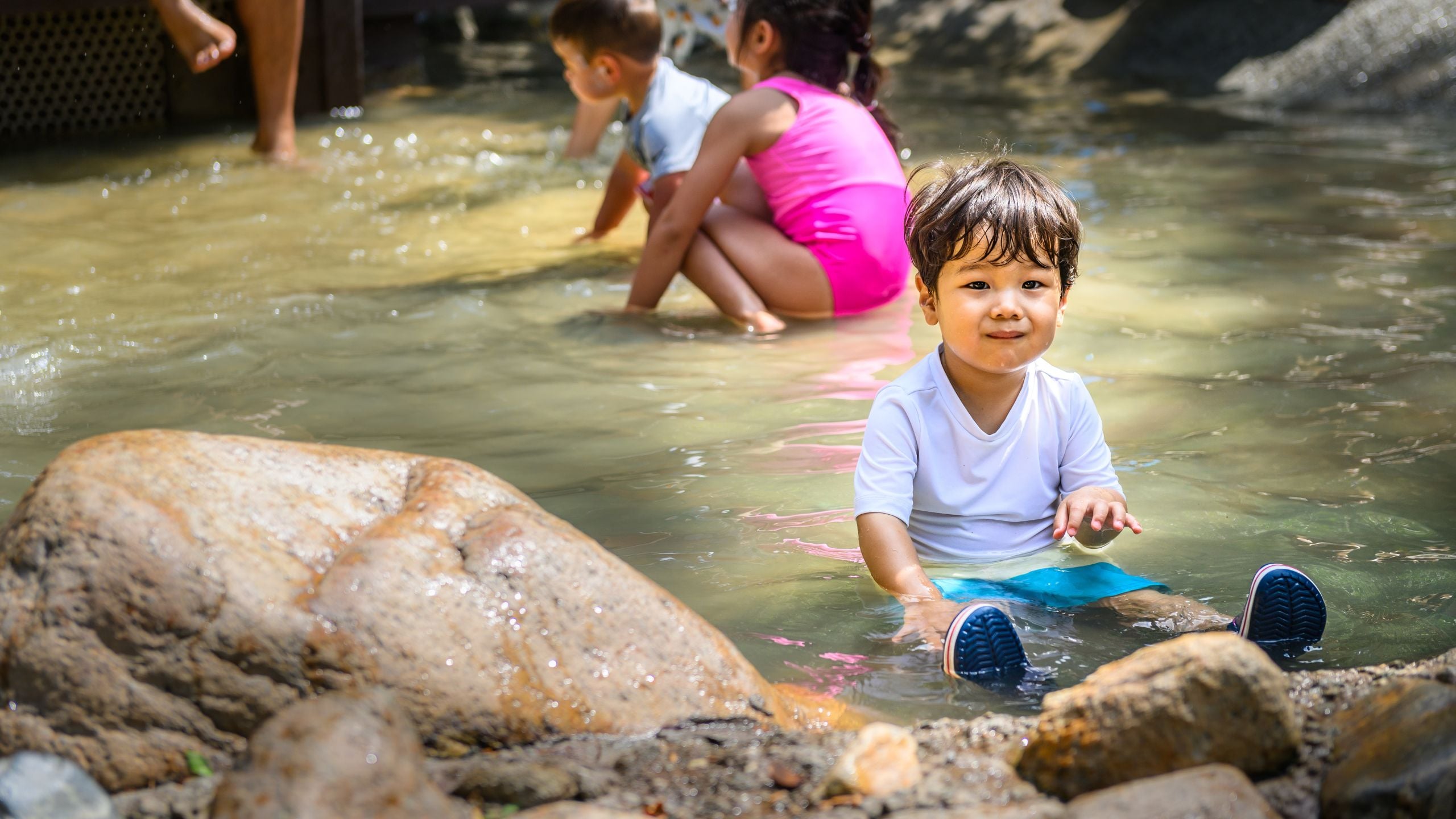 Children playing in shallow water