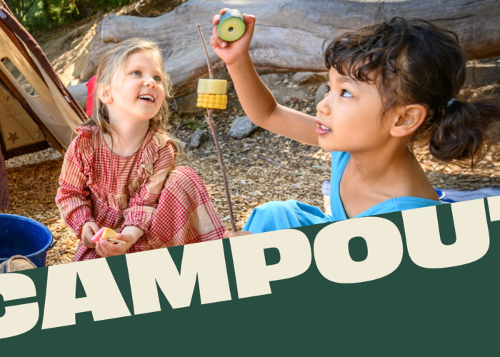 Two children pretending to campout