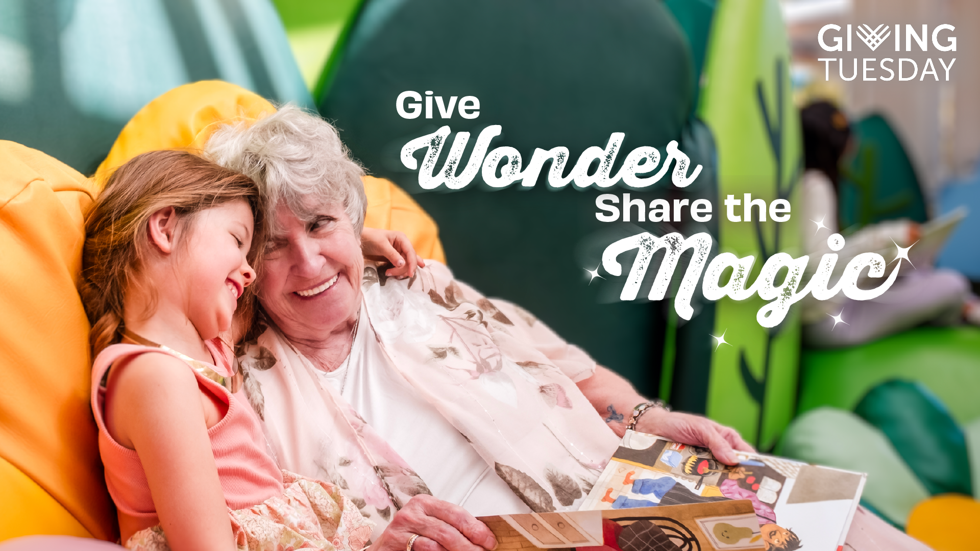Grandma and grand daughter reading a book